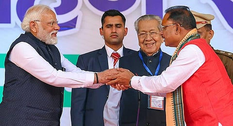 Prime Minister Narendra Modi being greeted by new Chhattisgarh Chief Minister Vishnu Deo Sai during the latter's swearing-in ceremony, in Raipur, Wednesday, Dec. 13, 2023. (PTI)