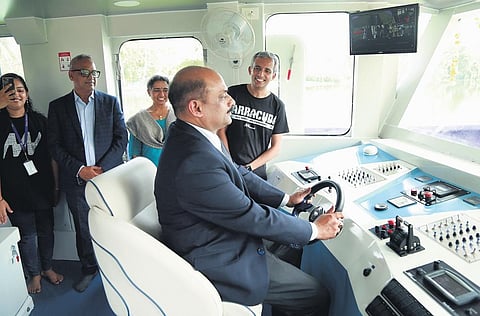 Mazagon GM Sanjay Kumar Singh along with Navalt CEO Sandith Thandasherry inaugurate the solar electric boat at Navgathi Yard, Panavally | T P Sooraj