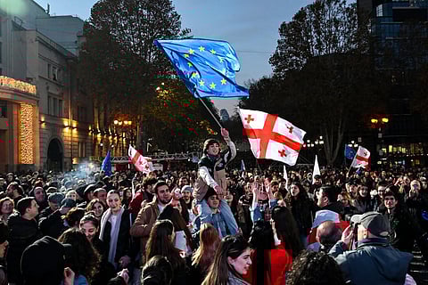 Georgians rally to celebrate the country's European Union candidate status in Tbilisi on December 15, 2023. (Photo | AFP)