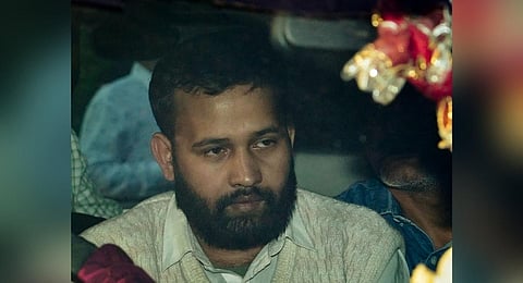 Lalit Jha, key accused in the recent Parliament security breach, being produced at the Patiala House Court, in New Delhi, Friday, Dec. 15, 2023. (PTI Photo)