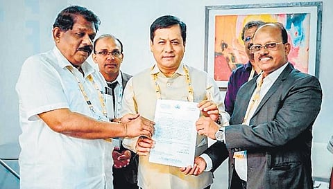 Ports Minister Ahammad Devarkovil and Transport Minister Antony Raju submitting a petition to Union Shipping Minister Sarbananda Sonowal for urgent action to start overseas passenger ships | FIle pic