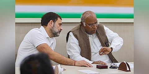 Congress President Mallikarjun Kharge with party leader Rahul Gandhi during a meeting at AICC headquarters. (Photo | PTI)