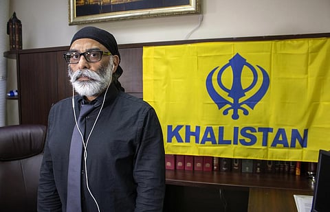 Sikh separatist leader and designated terrorist Gurpatwant Singh Pannun is pictured in his office.