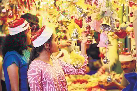 The pathways and shops are brimming with decor items for Chritmas in Kerala