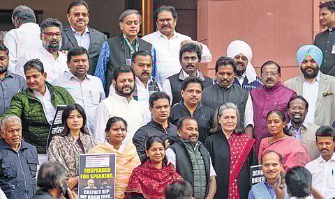 Congress leader Sonia Gandhi with suspended MPs during the winter session of Parliament in New Delhi on Friday | pti