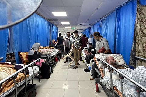 FILE - Patients and internally displaced people are pictured at Al-Shifa Hospital in Gaza City on November 10, 2023. (AFP Photo)
