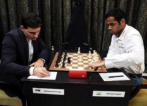 GM Arjun Erigaisi and GM Alexandr Predke on the Chennai grand masters Chess Tournament on Sunday. Express/ D Sampath kumar