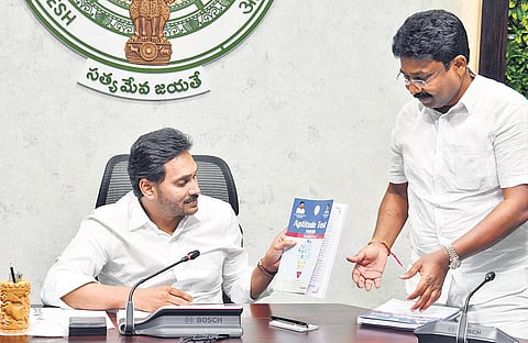 FILE - Chief Minister YS Jagan Mohan Reddy and Minister Audimulapu Suresh at a review meet at CM’s camp office in Tadepalli. (Photo I Express)
