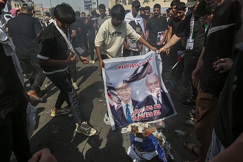 Representational Image: Iraqis burn poster showing US President Joe Biden and Israeli Prime Minister Benjamin Netanyahu during a mass rally supporting the Palestinians in the Gaza Strip. (Photo | AP)