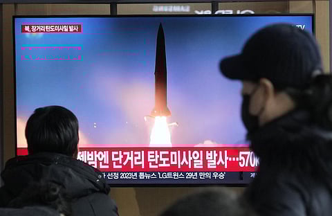 A TV screen shows a file image of North Korea's missile launch during a news program at the Seoul Railway Station in Seoul, South Korea, Monday, Dec. 18, 2023. (AP Photo)