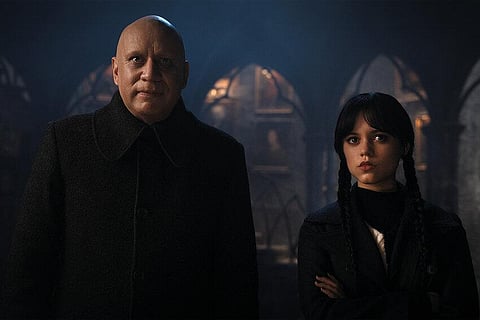 Fred Armisen as Uncle Fester, Jenna Ortega as Wednesday Addams in one of the episodes from 'Wednesday'. (Photo | Netflix)