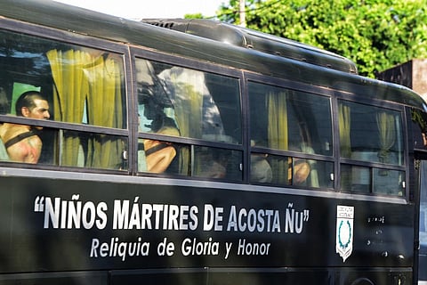 Policemen transport inmates from the Tacumbu prison to other prisons, in order to regain control of said prison, in Asuncion on December 18, 2023. (Photo | AFP)