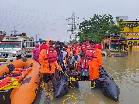 Indian Coast Guard men at rescue work in flood-hit Tuticorin district of Tamil Nadu | PTI