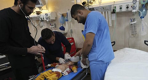 Palestinian child wounded in the Israeli bombardment of the Gaza Strip is treated in al Aqsa Hospital on Deir al Balah, Gaza Strip. (Photo | AP)