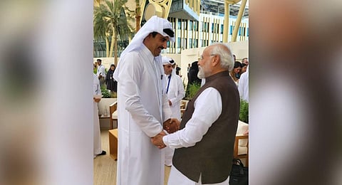 Prime Minister Narendra Modi with with Qatar’s Emir in Dubai on Saturday. (Photo | Twitter@Narendramodi)