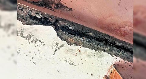 Cracks seen on walls of houses at a TNUHDB settlement in Perumbakkam | Express