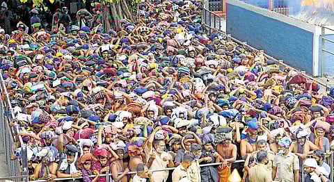 Heavy rush at lower thirumuttam. As many as 65,000 pilgrims visited the hill shrine till 3 pm on Tuesday | Express