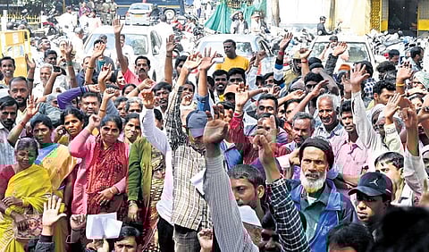 Street vendors from across the city protest in front of the BBMP head office on Tuesday | Shashidhar Byrappa