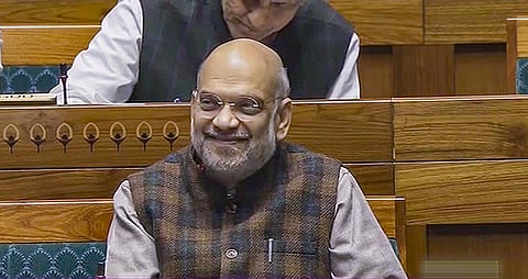 Union Home Minister Amit Shah in the Lok Sabha during the Winter session of Parliament, in New Delhi on Wednesday, December 20, 2023. (Photo | PTI)
