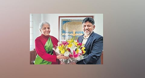 Deputy CM DK Shivakumar greets Union Finance Minister Nirmala Sitharaman in New Delhi on Wednesday. (Photo | Express)