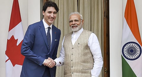 FILE - PM Narendra Modi shakes hands with his Canadian counterpart Justin Trudeau in New Delhi. (Photo | PTI)