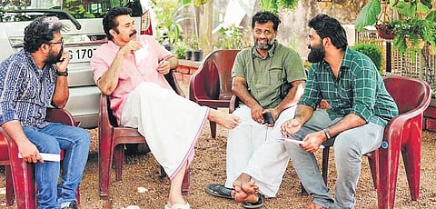 Mammootty with Jeo Baby, Adarsh Sukumaran and Paulson Skaria on the sets of Kaathal - The Core