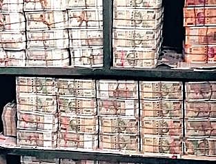 File photo of cash seized during I-T raids at the distillery group and linked entities in Odisha