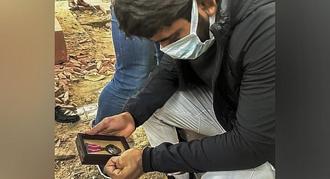 Wrestler Bajrang Punia holds his Padma Shri award near the Kartavya Path, in New Delhi, Friday, Dec. 22, 2023. (Photo | PTI)