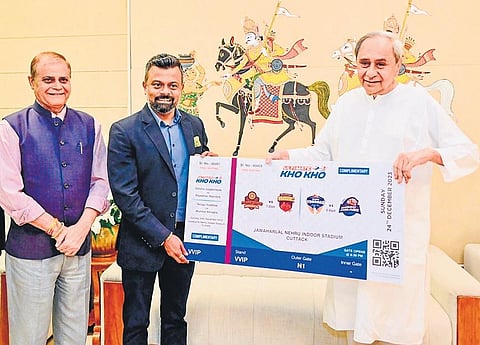 CEO of Ultimate Kho Kho League Tenzing Niyogi presenting the first ticket of season 2 to Chief Minister Naveen Patnaik in Bhubaneswar on Friday | Express