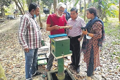 Ashok Sadangi giving lessons on bee keeping