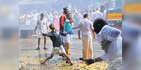 Congress activists hurling stones at the police during the march in Trivandrum on dec 23, 2023 (Photo | Express)