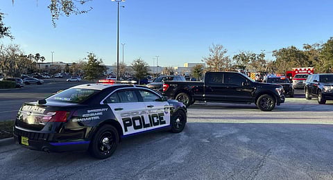 Ocala Police Department, a cruiser sits parked following a fatal shooting at Paddock Mall in Ocala. (Photo | AP)