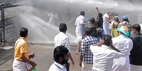 The police striking water cannons at the Congress activists when the Congress protest march towards the DGP office at Vazhuthacaud in Thiruvananthapuram turned violent on Saturday. (Photo | Express)