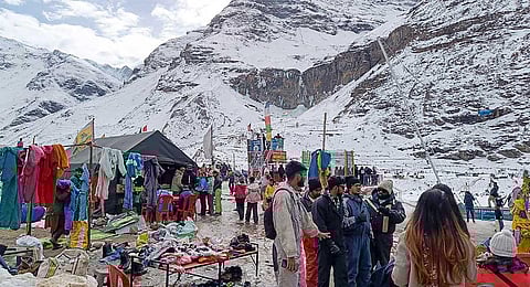 Tourists visit the north portal of Atal Tunnel ahead of the Christmas and New Year celebrations, in Manali, Sunday, Dec. 24, 2023. (PTI)