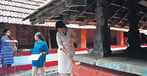 Swathi Subramanian, Savita Rajan and Ritu Sara taking measurements of Kunnamangalam Bhagawati Temple’s Karnikara Mandapam