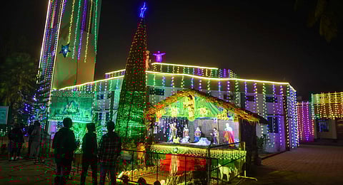 People from the Christian community thronged Our Lady of Most Holy Rosary Cathedral Church for Christmas in Cuttack on Sunday night. (Express Photo | Debdatta Mallick)