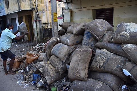 Ration shop rice was thrown away in the flood-affected area at Eral in Thoothukudi | V Karthikalagu
