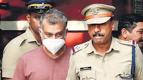 Police bringing Sanu Mohan out of the Ernakulam court after the verdict on Wednesday. (Photo | T P Sooraj)