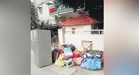 The belongings of P Kumar that were thrown out by the owner in Krishna Reddy Layout in Banaswadi. (Photo | Express)