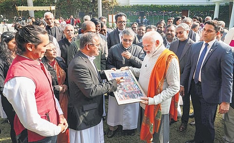 Prime Minister Narendra Modi with Christian community members during Christmas celebrations in New Delhi on Monday | pti