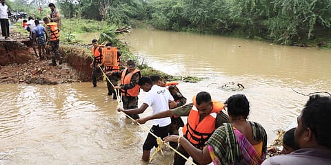 People rescued from the flood affected areaat Agaram in Thoothukudi district
