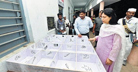 Karimnagar collector Pamella Sathpathi reviews preparations at a counting centre. (Photo | Express)