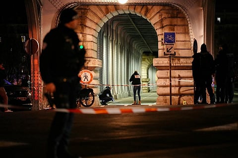 Forensic police work at the scene of a stabbing in Paris on December 2, 2023. (Photo | AFP)