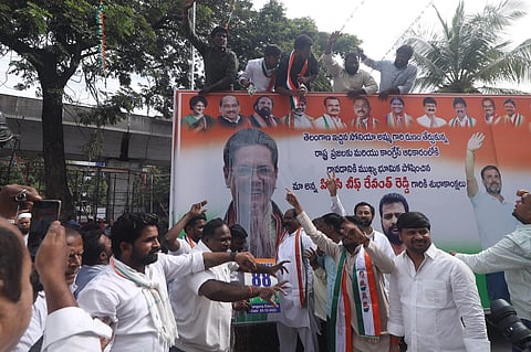 Congress supporters celebrate at the state headquarters Gandhi Bhavan, Hyderabad as Congress leads in Telangana Assembly Elections. (Express | Sri Loganathan Velmurugan)