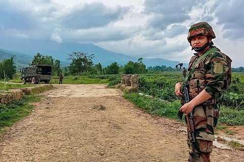 Representational image of a security personal patrolling a violence-hit area in Manipur