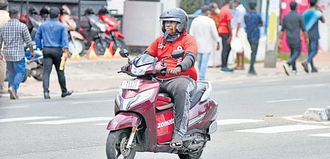 A delivery executive is on his way to deliver an order | B P Deepu