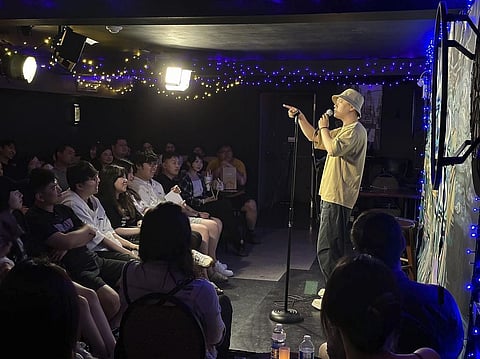 Comedian Lin Dongxiao, who uses the stage name Guazi, Lin performs standup in Toronto, Saturday, June 10, 2023. Lin moved back to China to pursue a career in standup comedy. (Photo | AP)