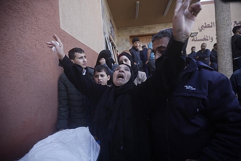 Palestinians attend a funeral of their relatives killed in the Israeli bombardment of the Gaza Strip in Khan Younis, Wednesday, Dec. 6, 2023. (Photo | AP)