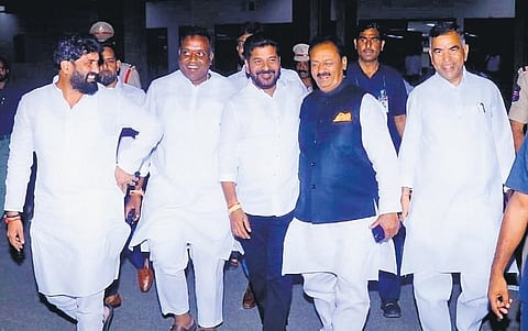 Senior Congress leaders see off CM-designate Revanth Reddy at the Begumpet Airport as he leaves for Delhi on Tuesday