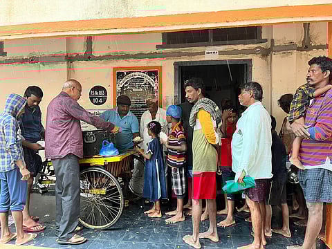 Food being distributed to people at a relief camp in Bapatla (Photo | Express)